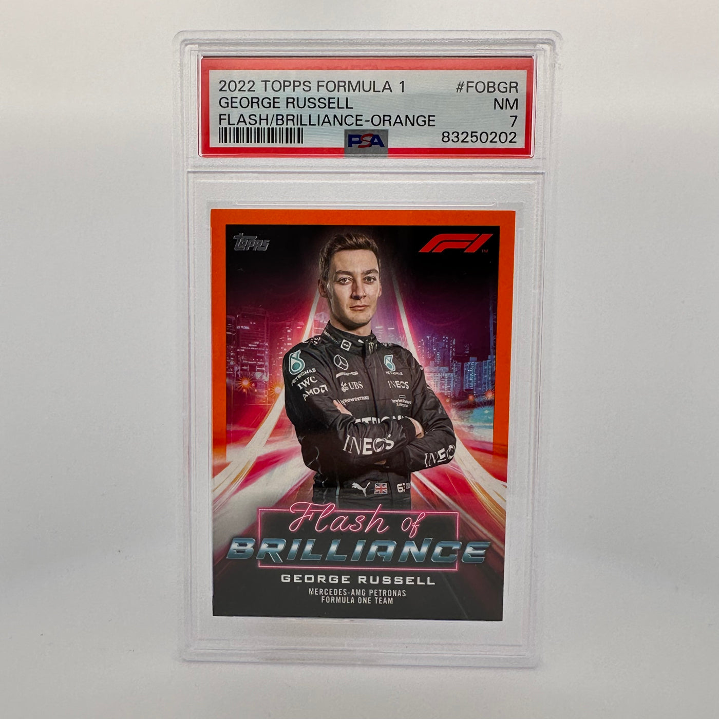 PSA 7 - 5/25 - George Russell #FOBGR - Flash Of Brilliance - Orange