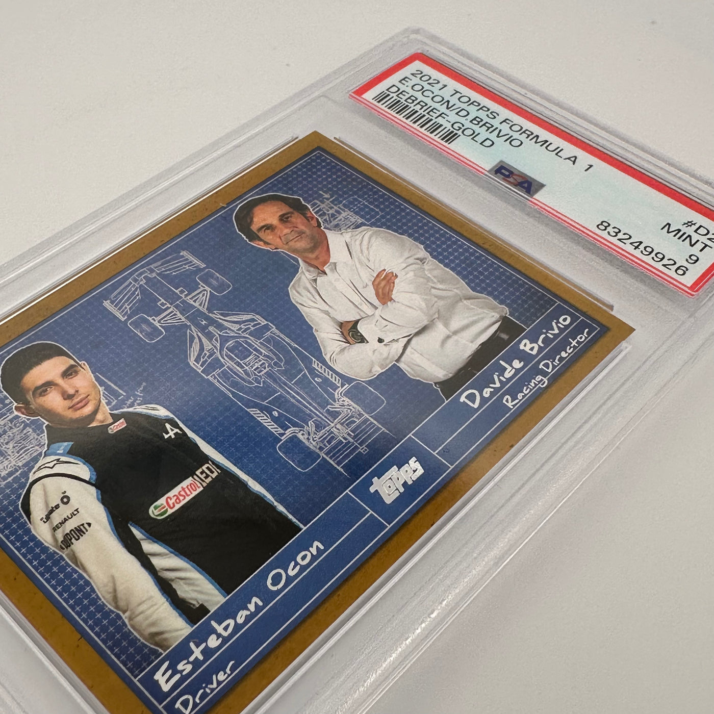 PSA 9 - 23/50 - Esteban Ocon/davide Brivio - Debrief #D2 - Gold