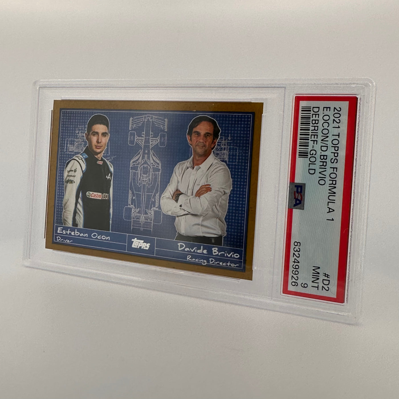 PSA 9 - 23/50 - Esteban Ocon/davide Brivio - Debrief #D2 - Gold