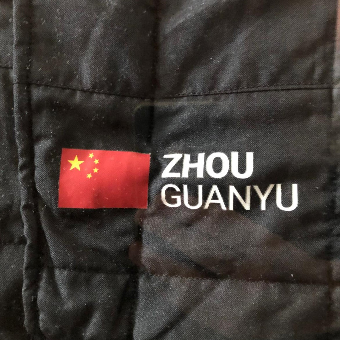 Signed Race Used Race Suit - Zhou Guanyu - Gulf Air Bahrain GP